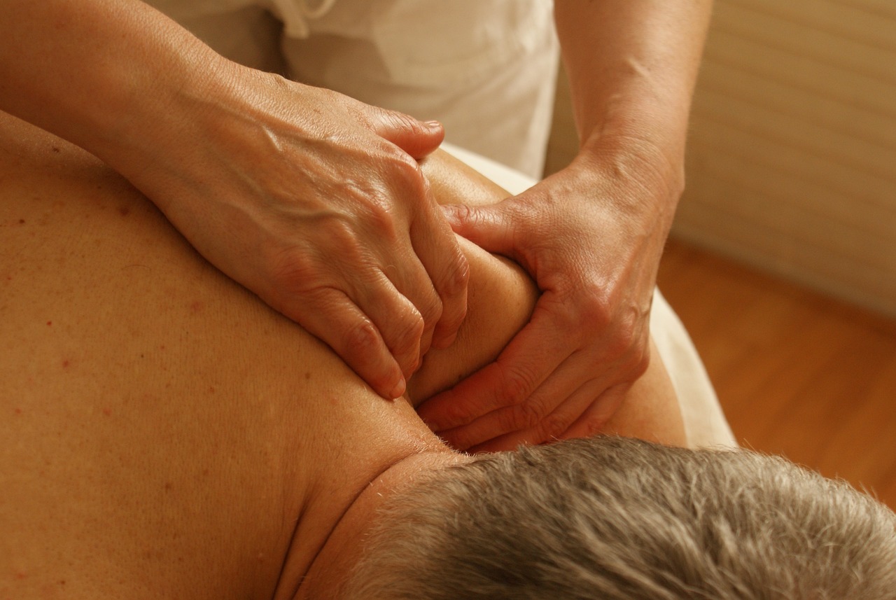stress relief massage elderly man back massage
